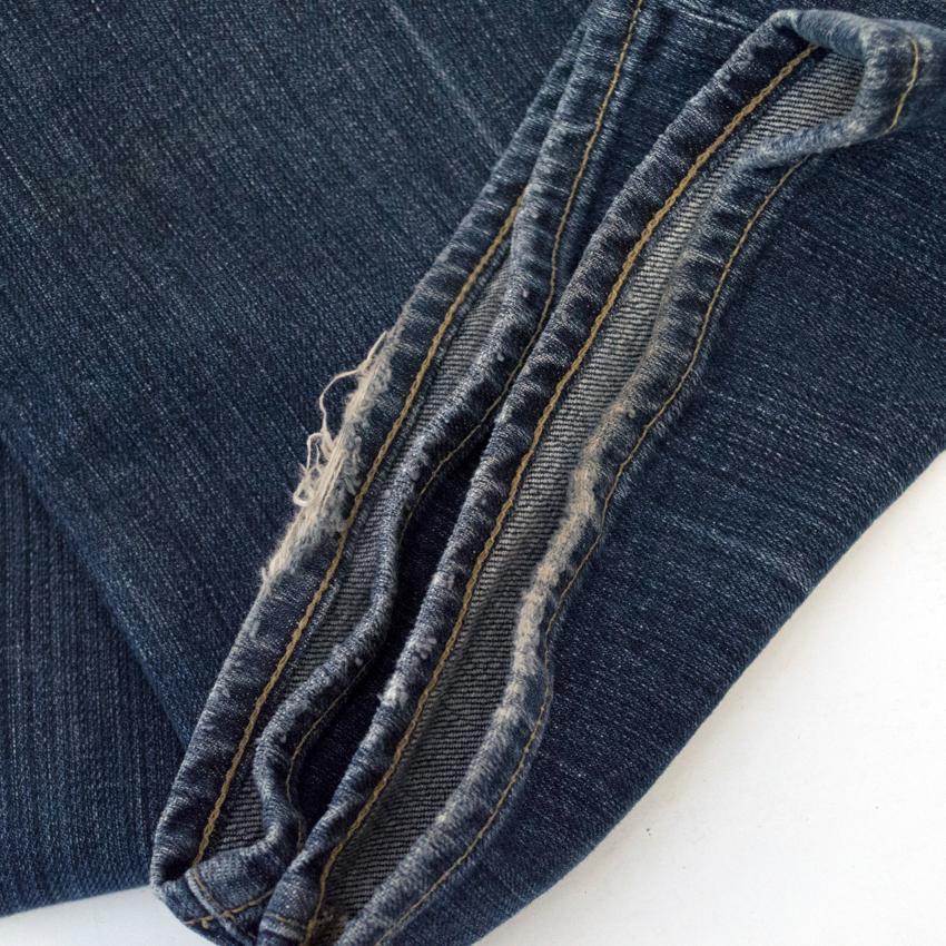 Paige Denim Flared Jeans with Back Pocket Embroidery