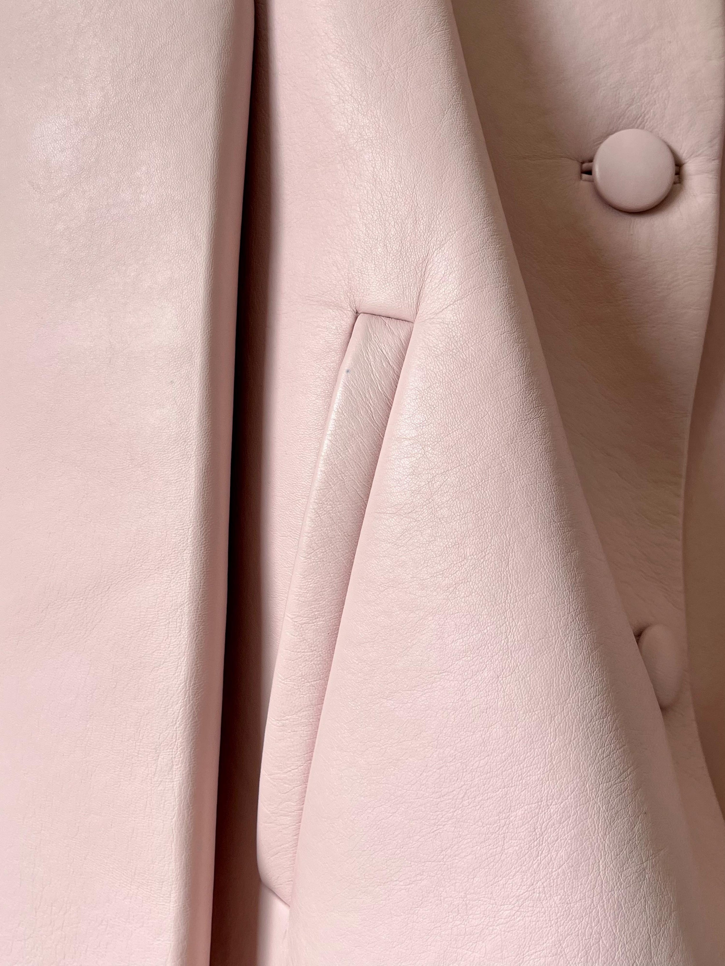 Pale pink cropped leather jacket