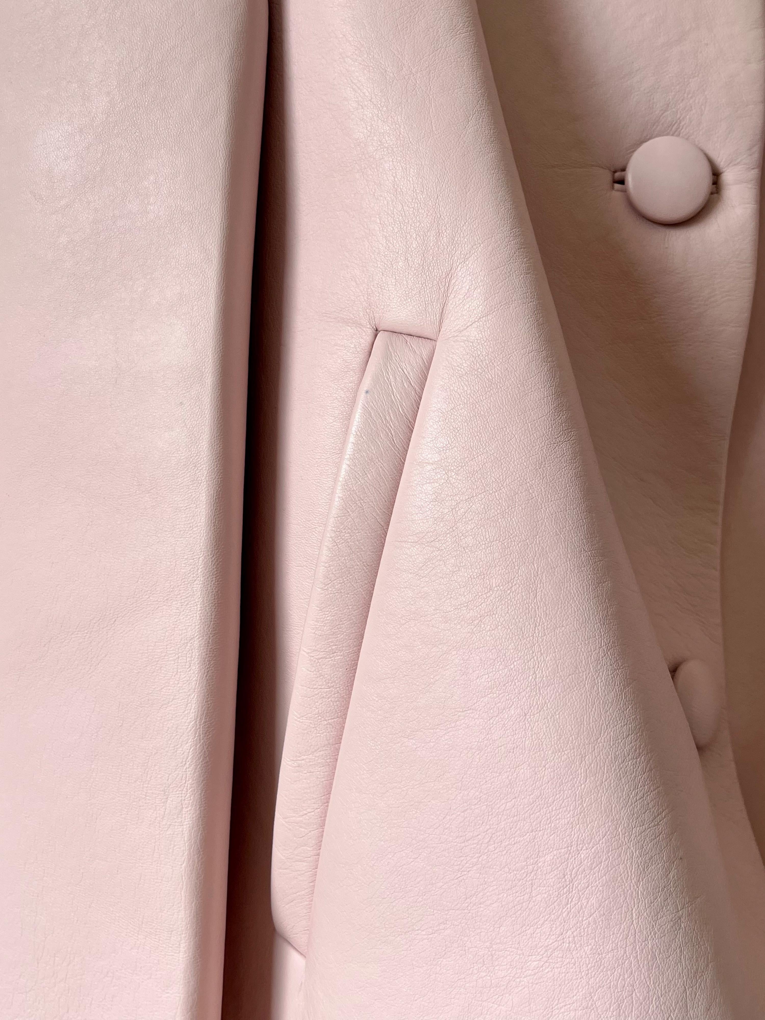 Pale pink cropped leather jacket