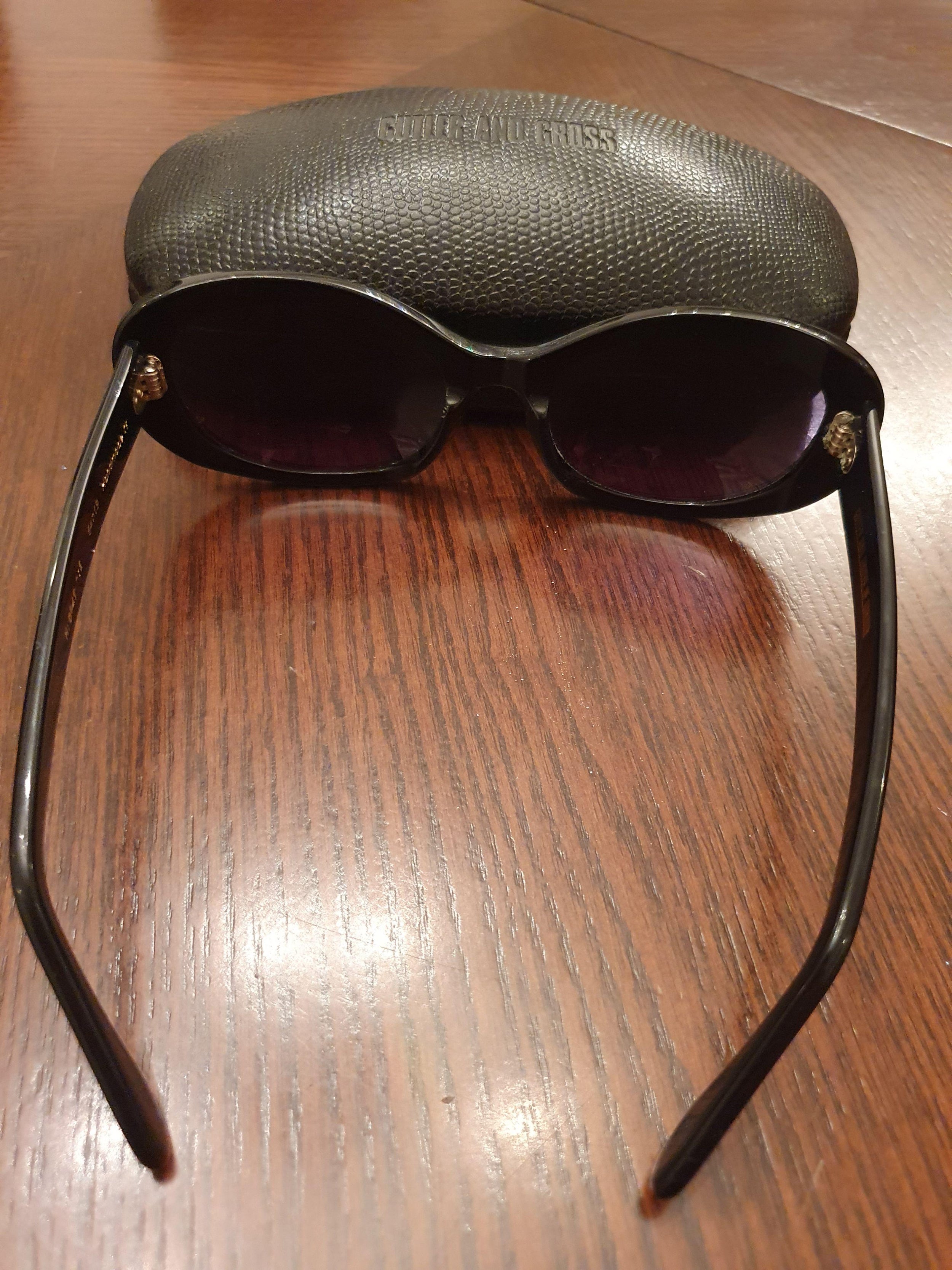 Black acetate oval sunglasses