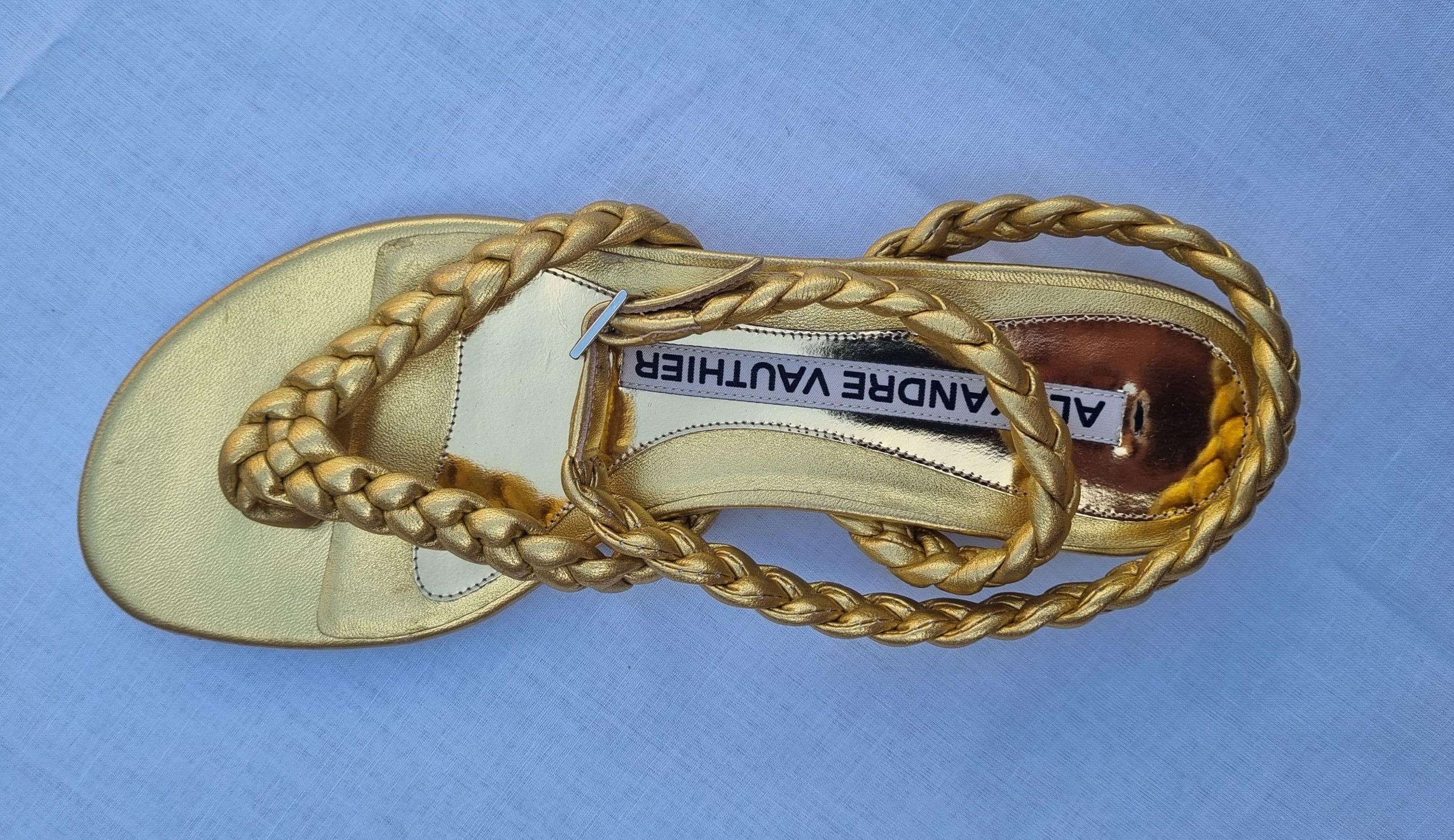 Gold leather braided thong sandals