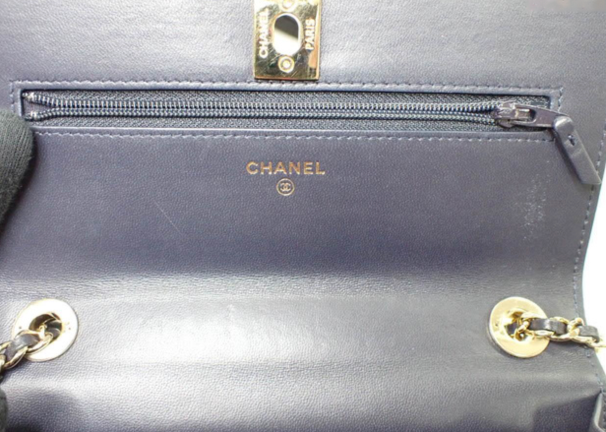 Chanel Quilted Black Leather Mini Flap Bag with Gold Tone Hardware