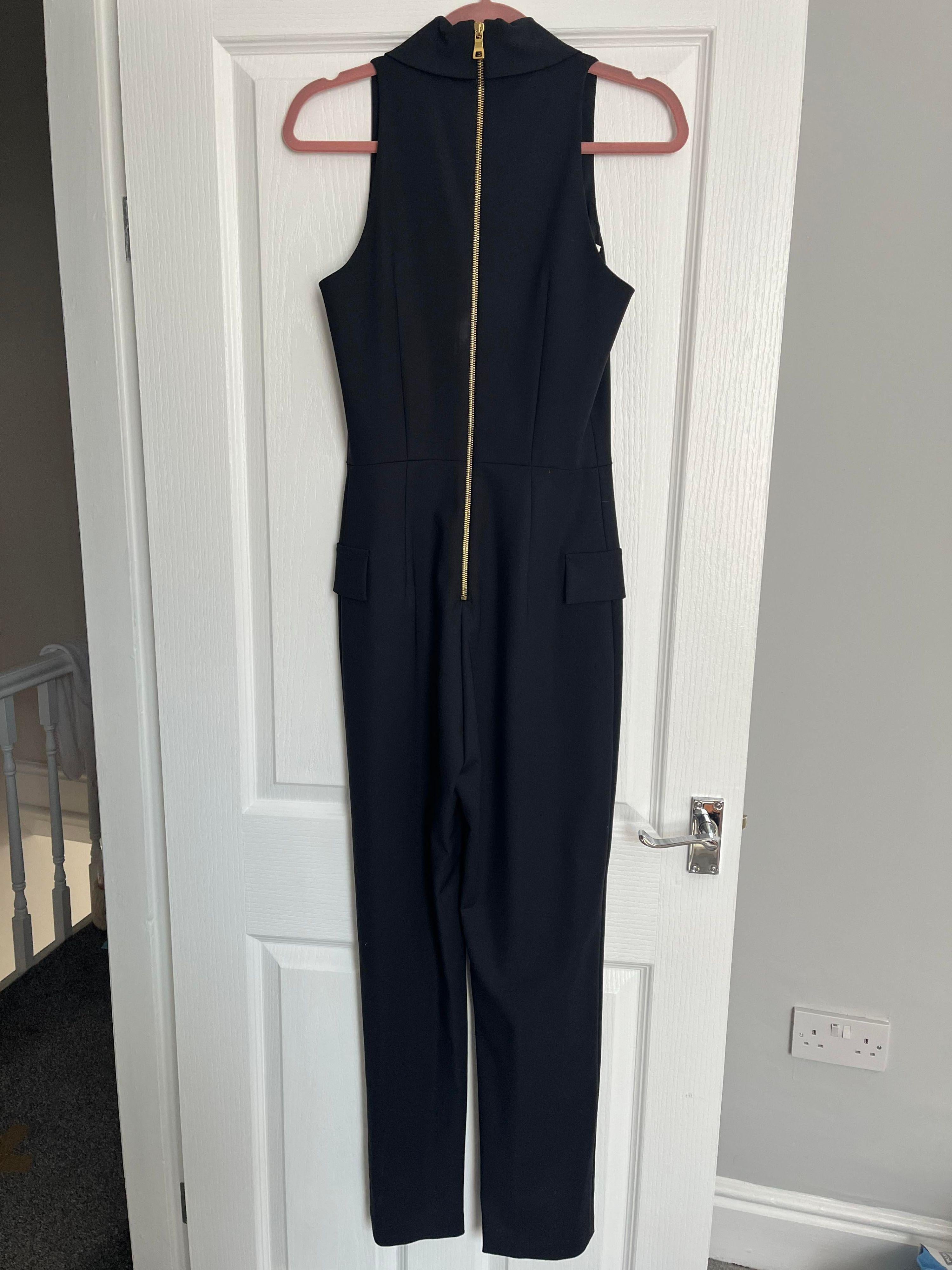 sleeveless double breasted jumpsuit