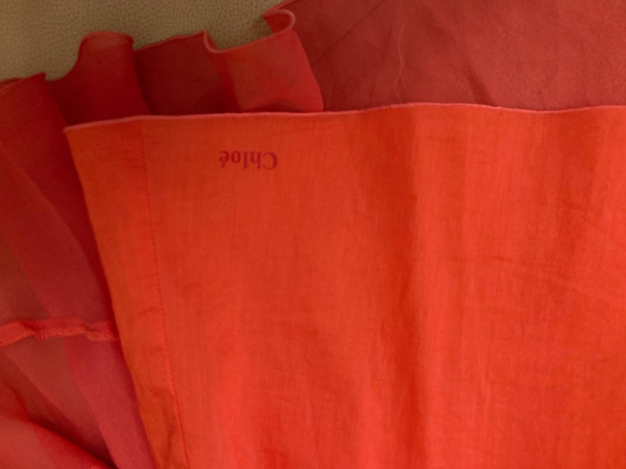 coral silk crepe ruffled dress