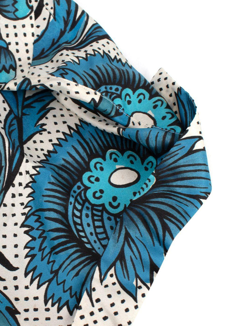 blue/white short sleeve shirt with floral print