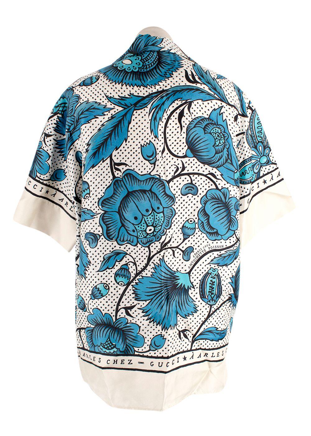 blue/white short sleeve shirt with floral print