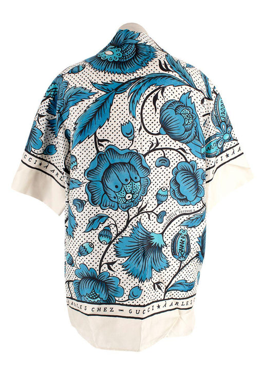 blue/white short sleeve shirt with floral print