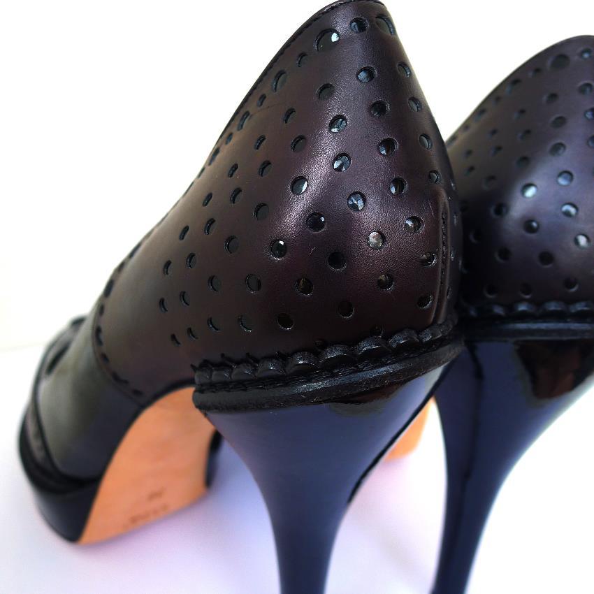 Gucci Black Riddle Leather Platform Heels