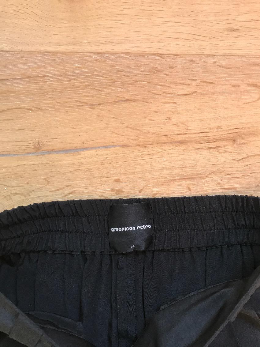 American Retro black silk trousers