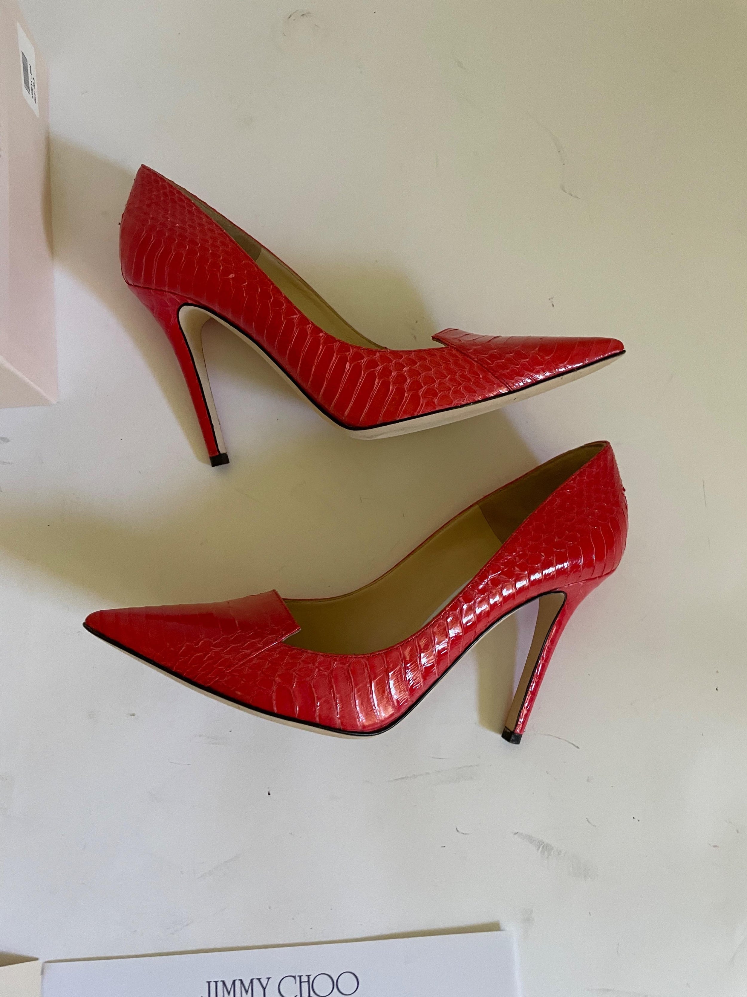 Red snakeskin Avril heeled pumps