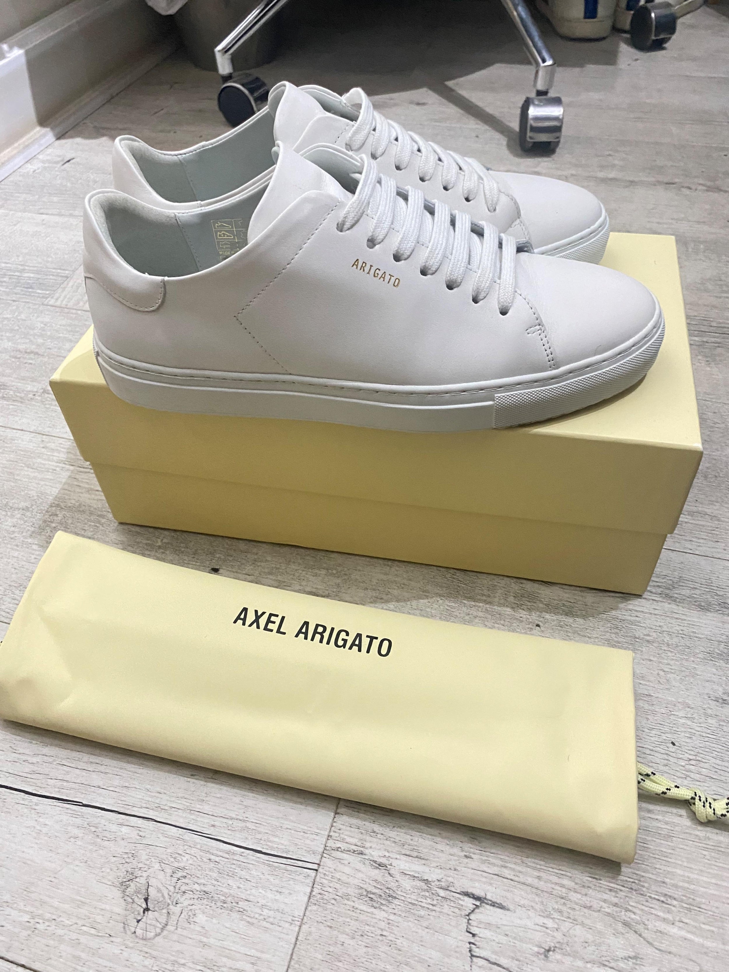 white leather low top trainers