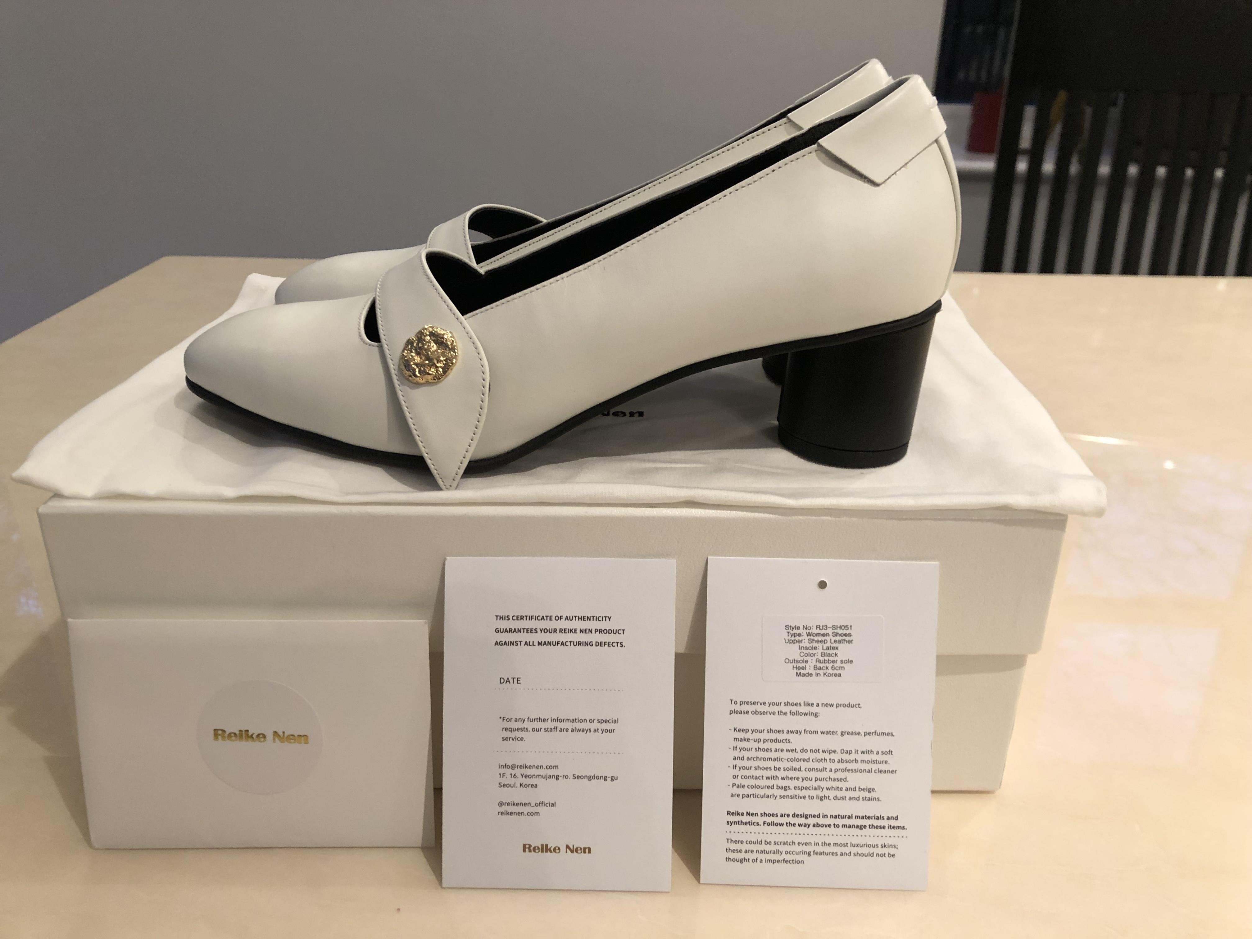 Reike Nen white leather pumps