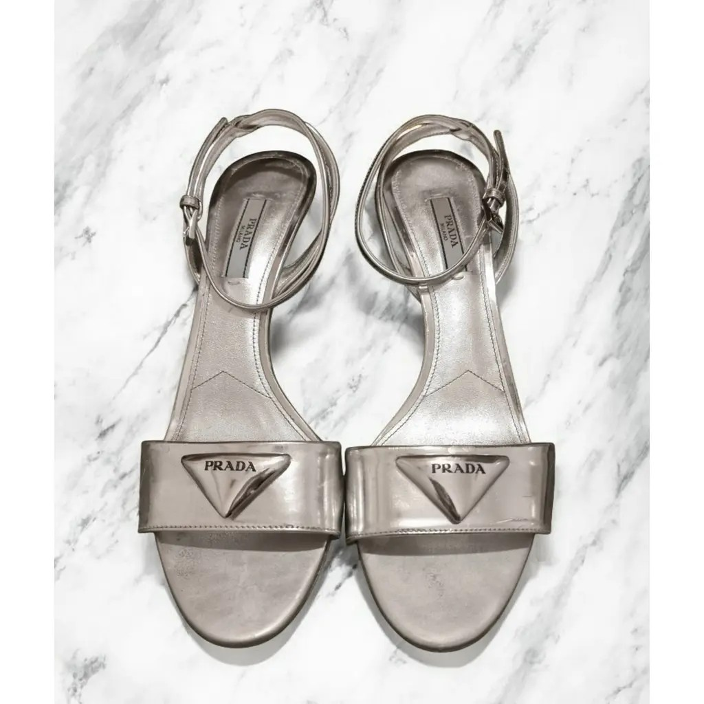 Prada Modellerie Logo-Plaque Metallic-Leather Sandals.