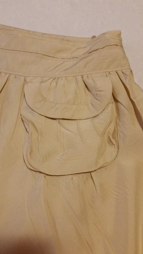 Miu Miu beige pleated mini skirt