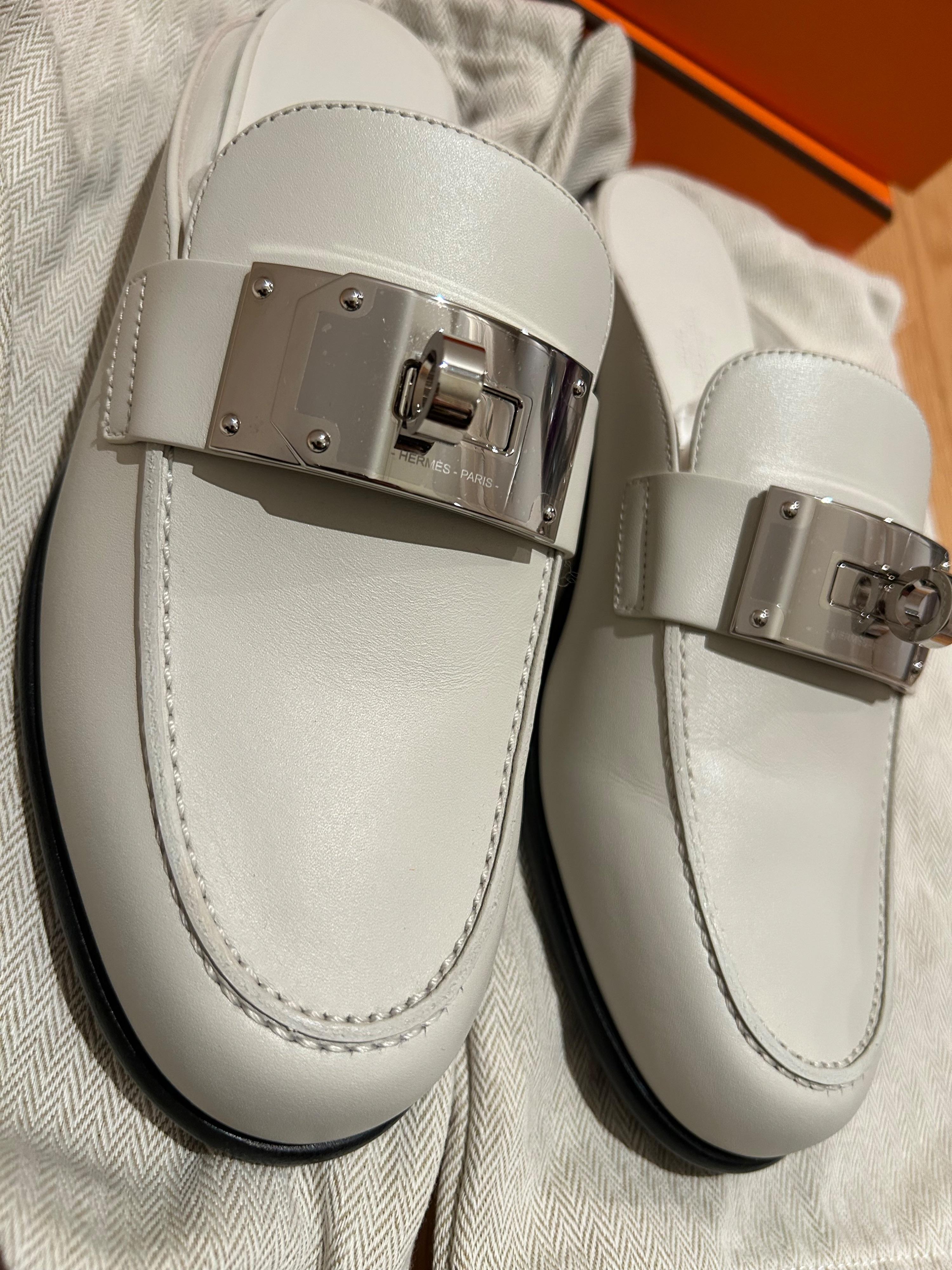 Hermes White Kelly Buckle Mules