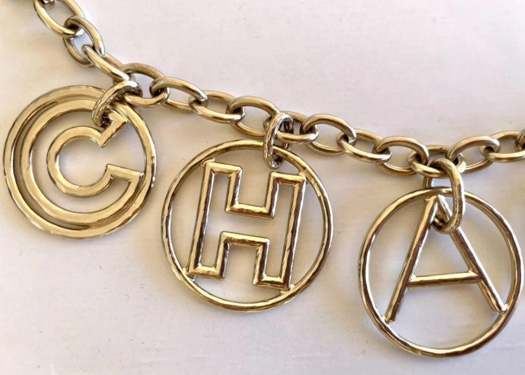 Chanel Gold Tone Letter Necklace