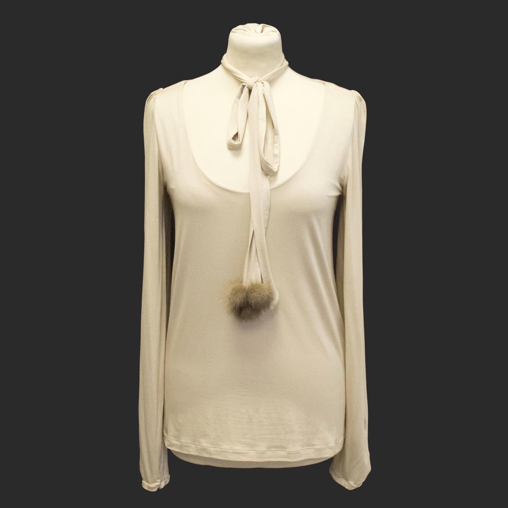 Schumacher beige top with fox fur