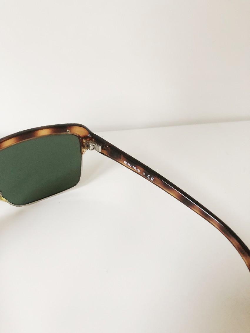 Miu Miu Tortoise Shell Sunglasses