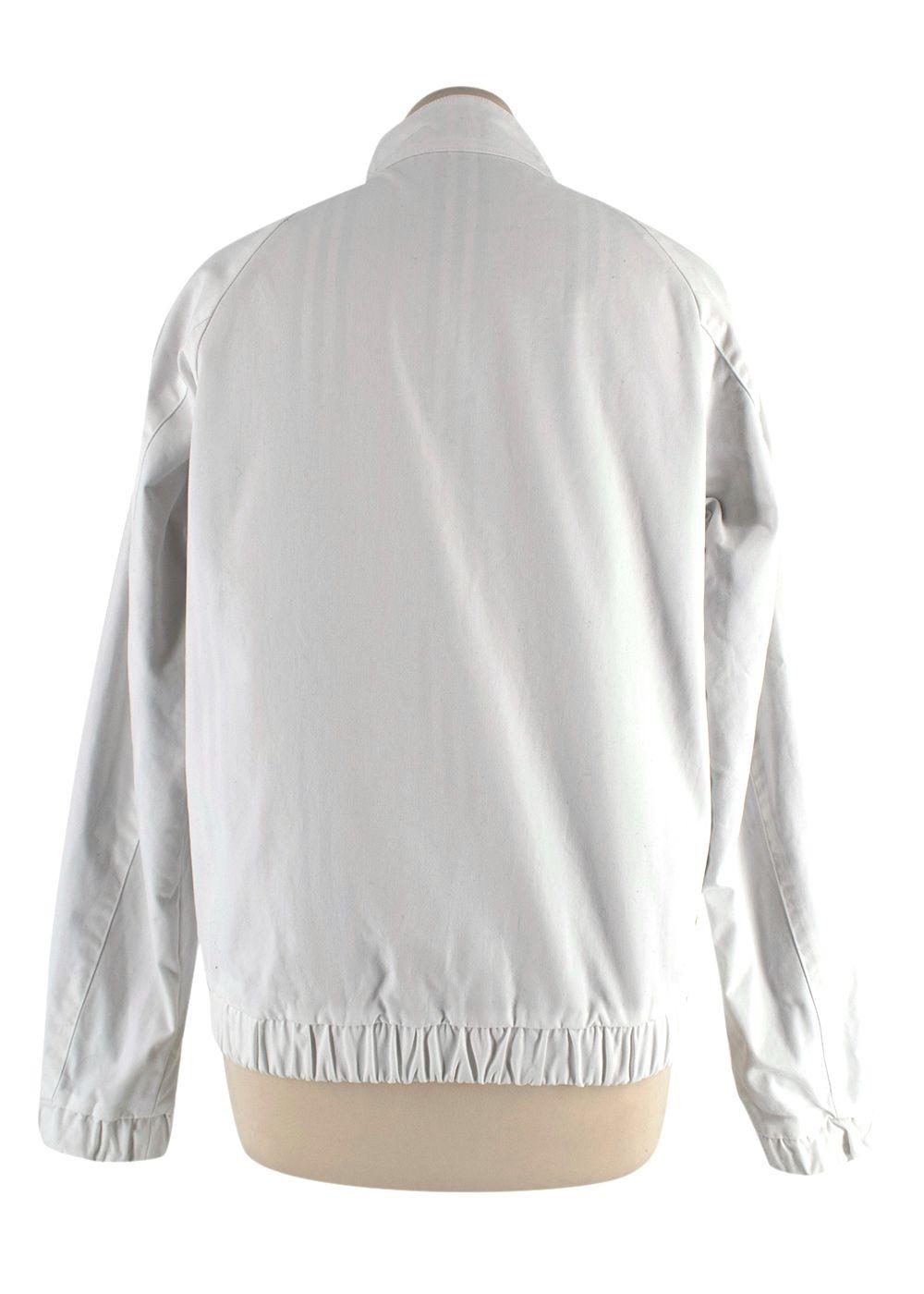 white sports coat with Burberry print