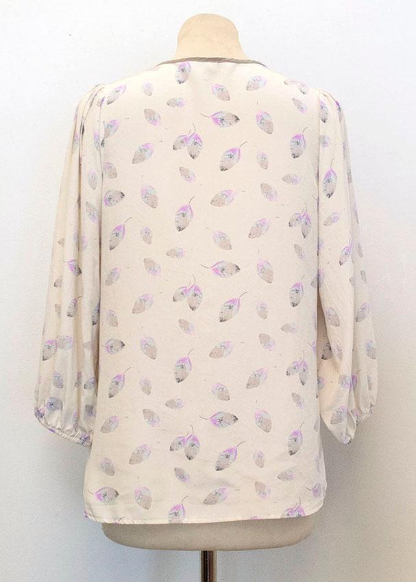 Tucker leaf print blouse