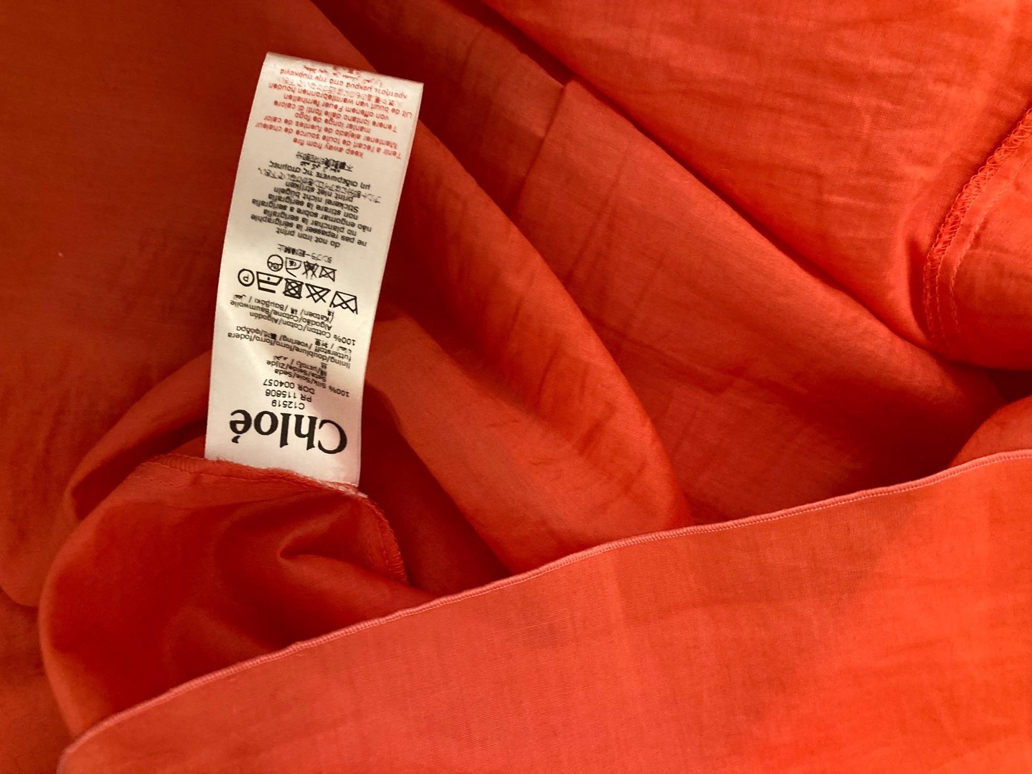 coral silk crepe ruffled dress