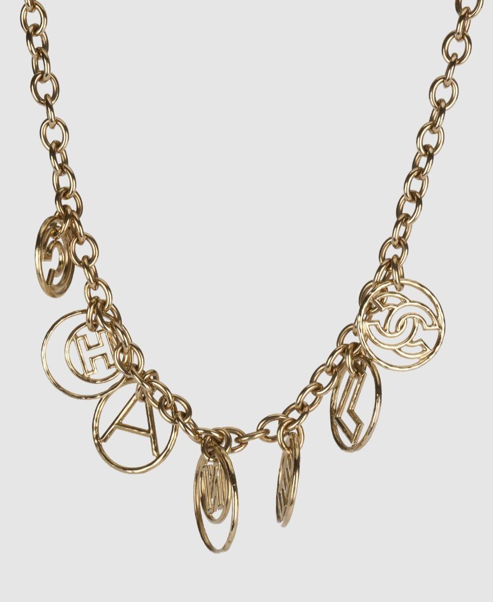 Chanel Gold Tone Letter Necklace