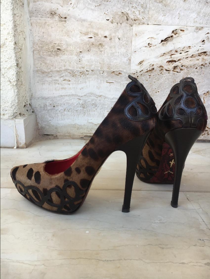 Cesare Paciotti animal print pony hair stiletto pumps