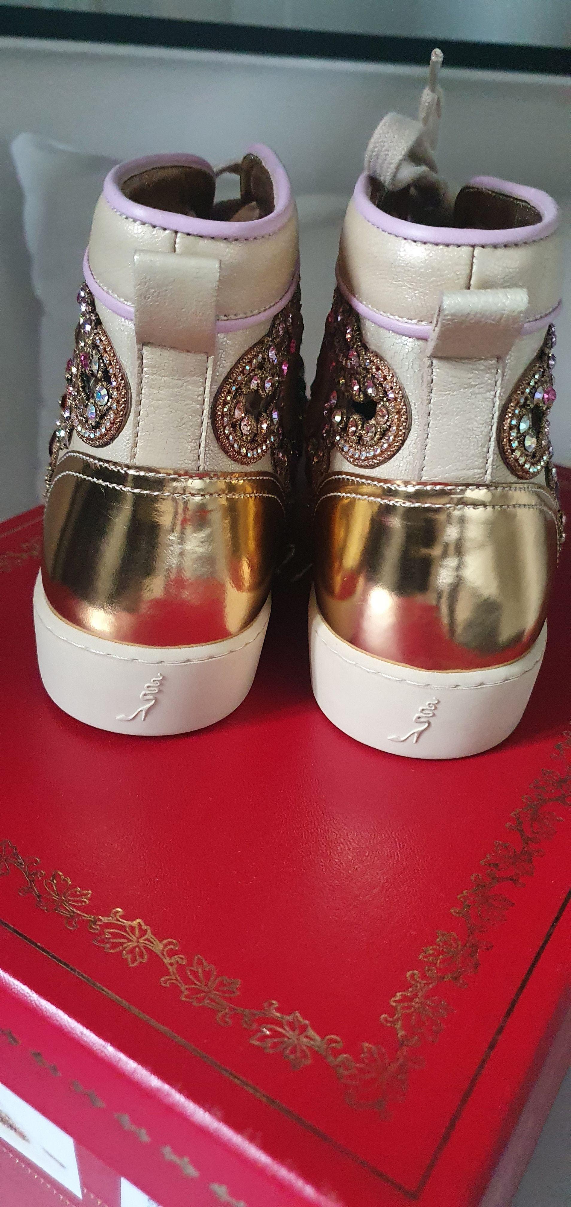 Metallic gold leather & crystal cut-out trainers