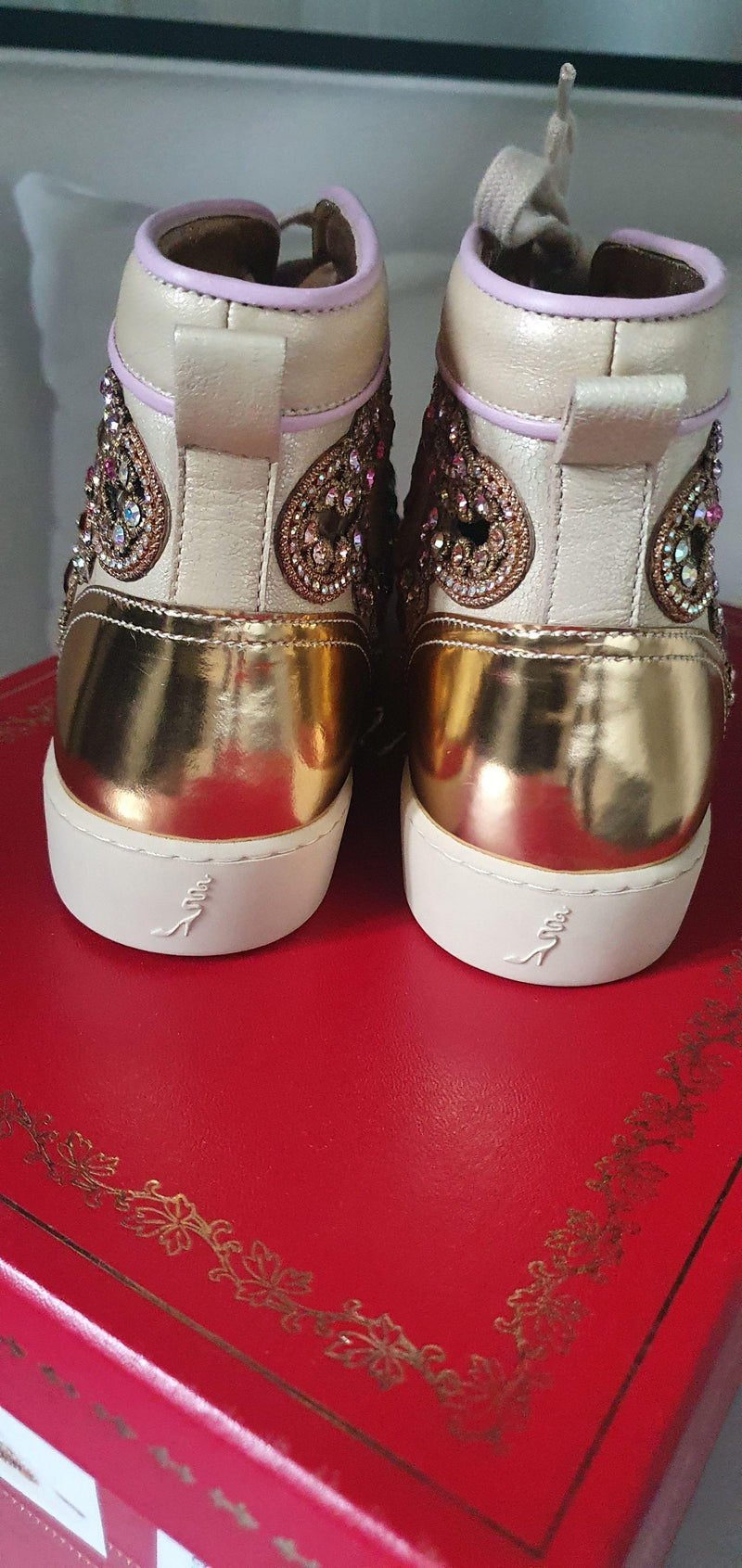 Metallic gold leather & crystal cut-out trainers