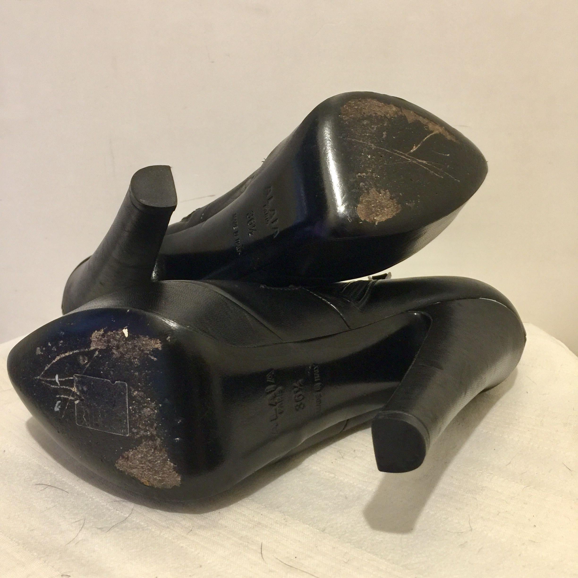 Black leather cut-out platform heeled booties