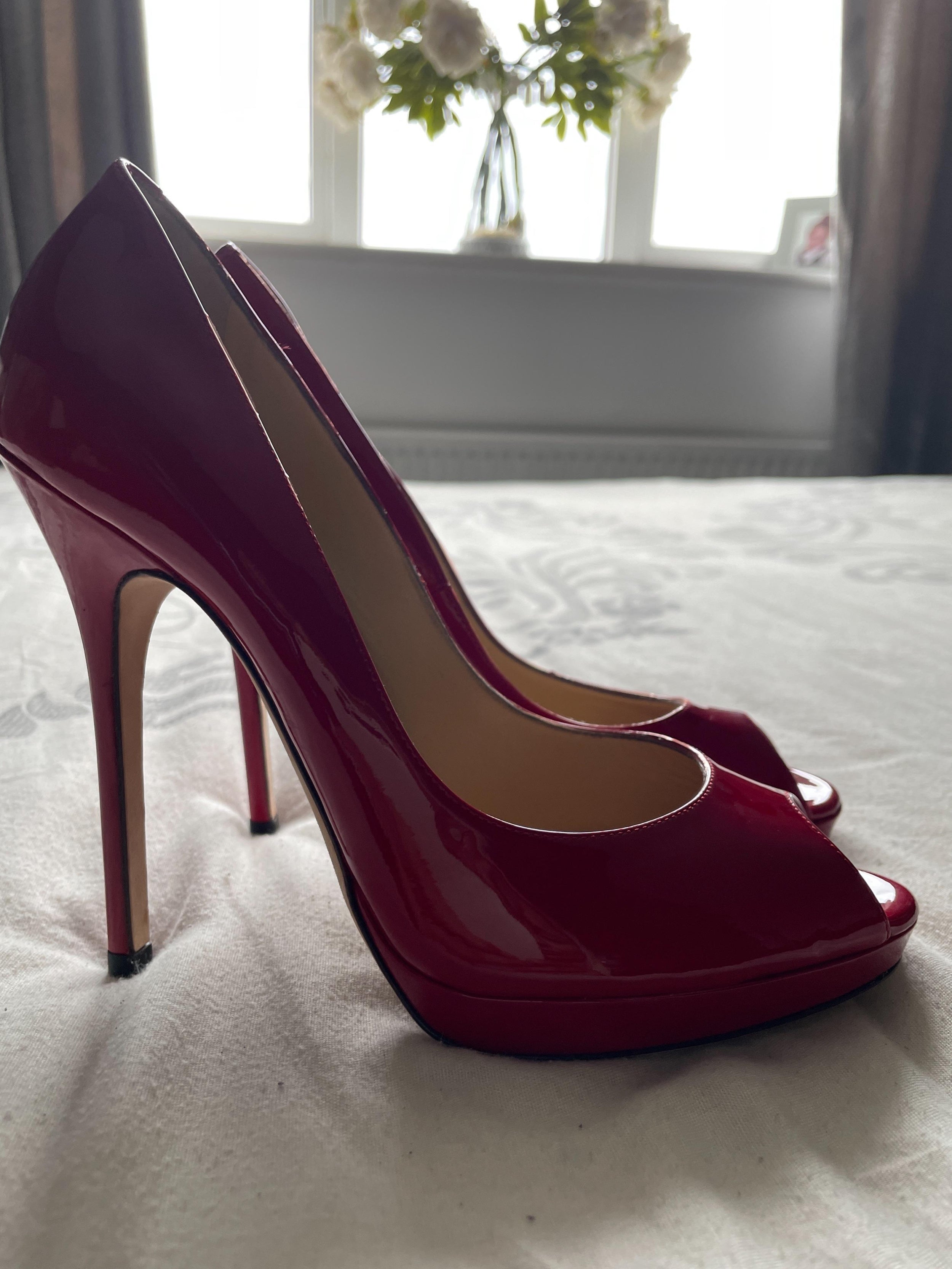Red patent Luna heeled pumps