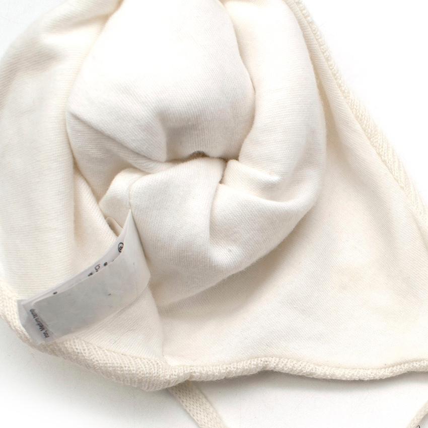 White Wool Knit Beanie with a Pom Pom and Bows