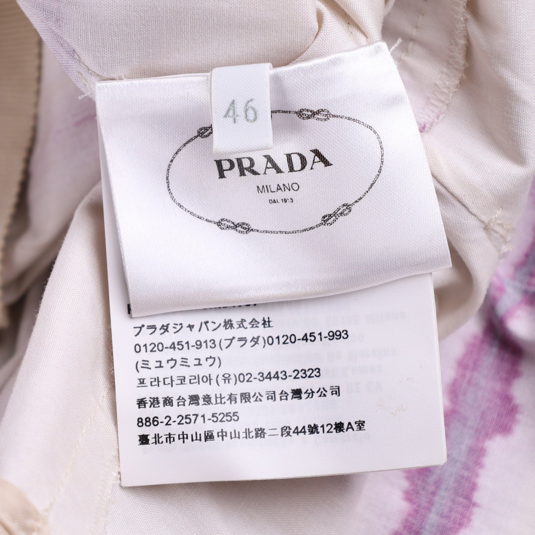 ⁠Prada Tie-Dye Grid Poplin Dress.