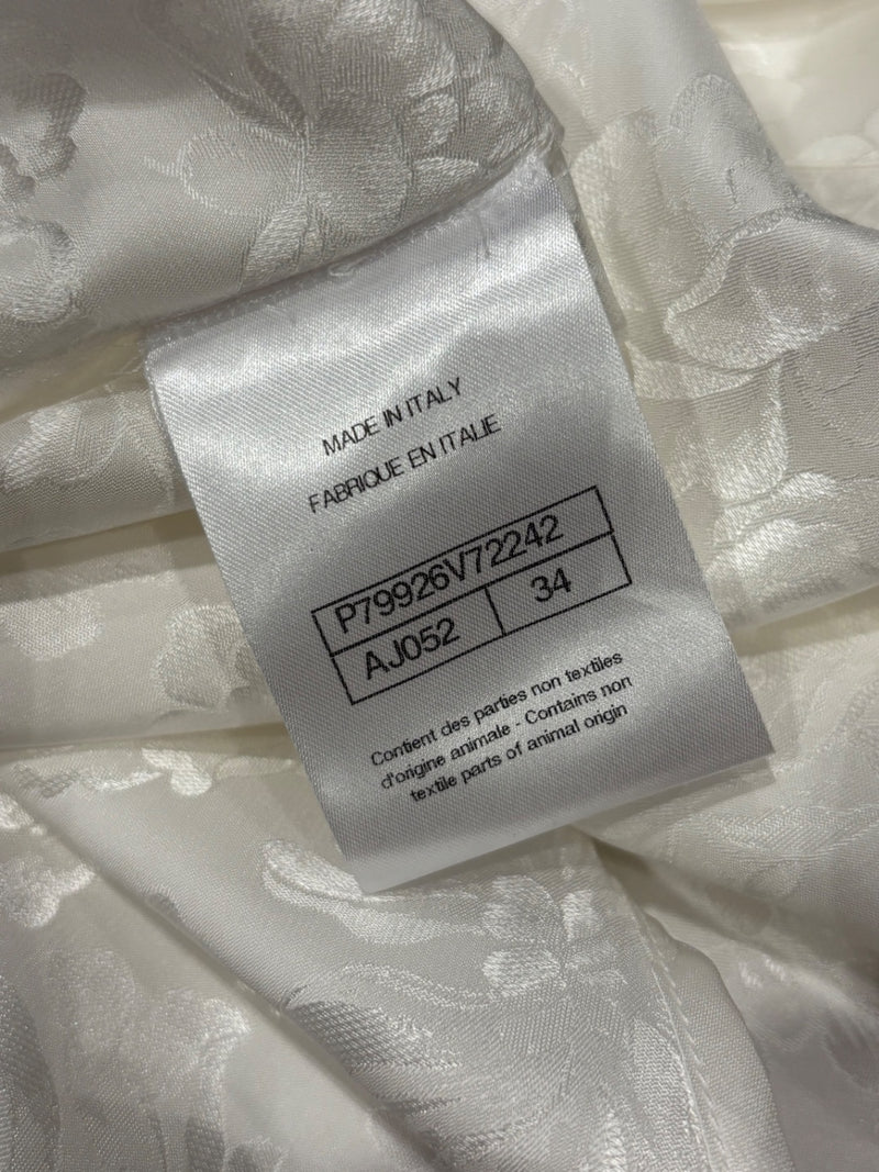 Chanel (indicated by logo on buttons) White Fabric with floral jacquard pattern Tops
