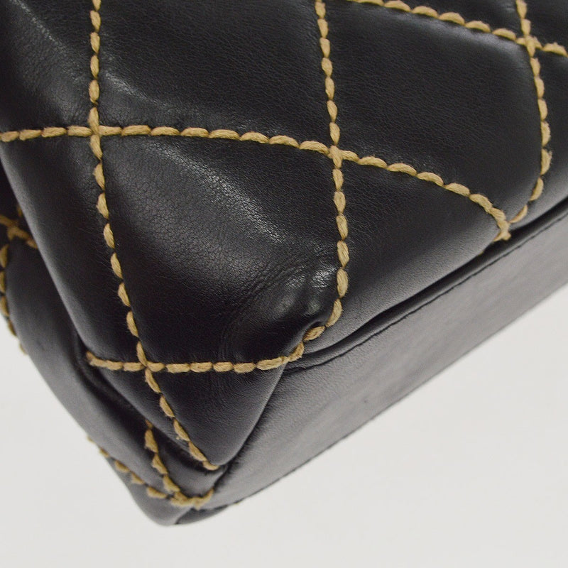 Chanel Surpique Classic Top Handle Flap Quilted Lambskin Black Leather Bag