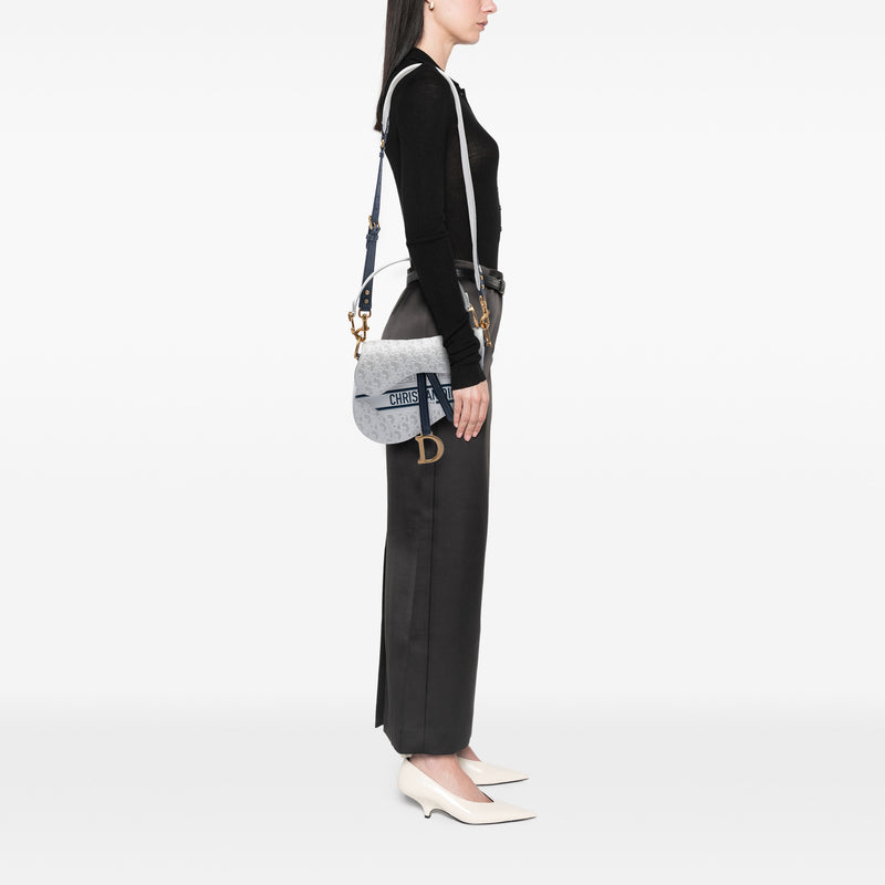 Perforated Oblique Embossed Calfskin Saddle Bag - Image 7
