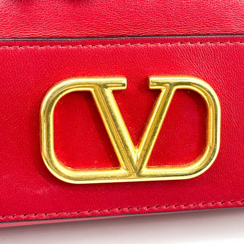 Valentino Garavani Vlogo Drawstring Bucket Leather Gold Bag