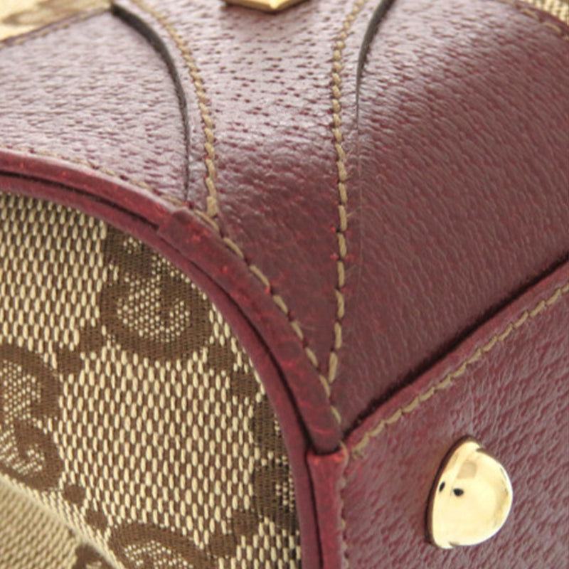 GG Canvas Nailhead Handbag - Image 12