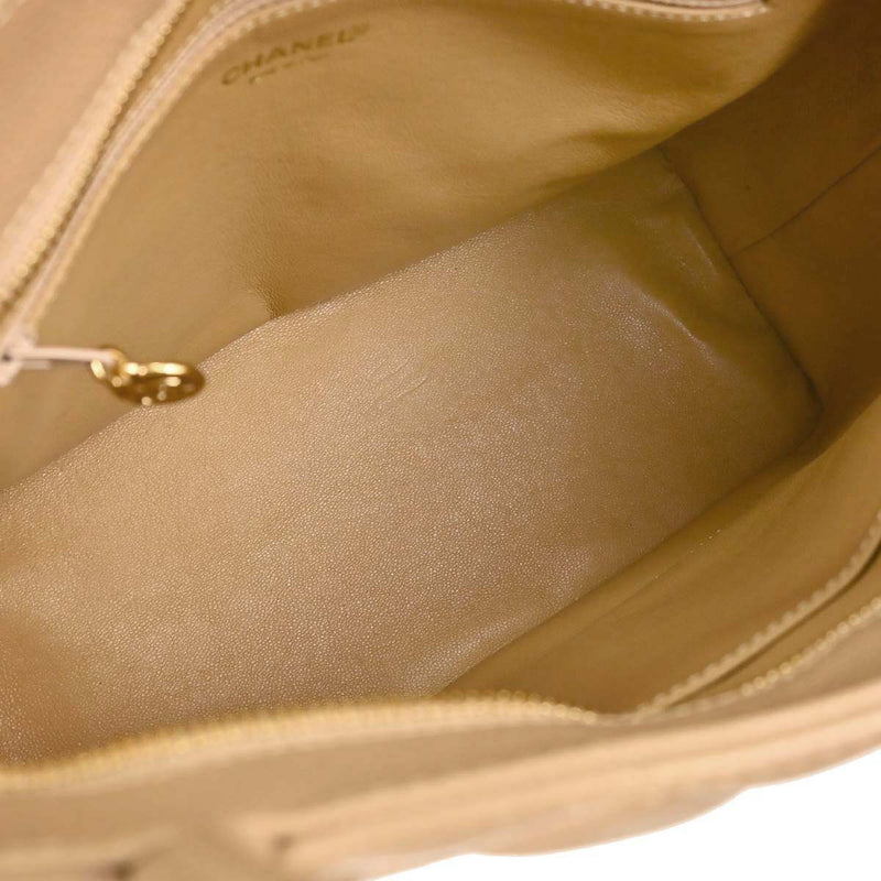 Chanel Medallion Quilted Caviar Beige Leather Bag