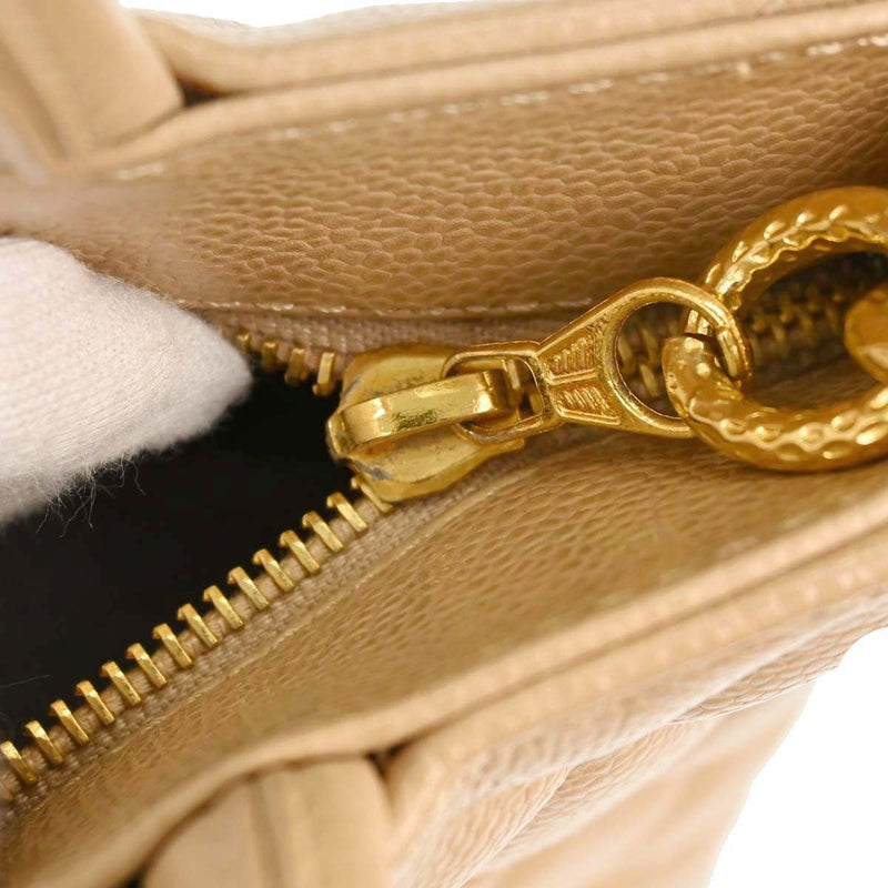 Chanel Medallion Quilted Caviar Beige Leather Bag