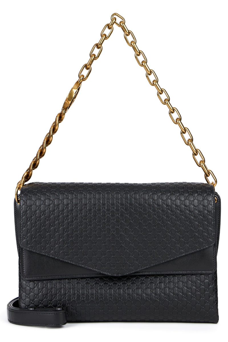 Gucci Gg Monogram Embossed Shoulder Bag — Black Calf Skin
