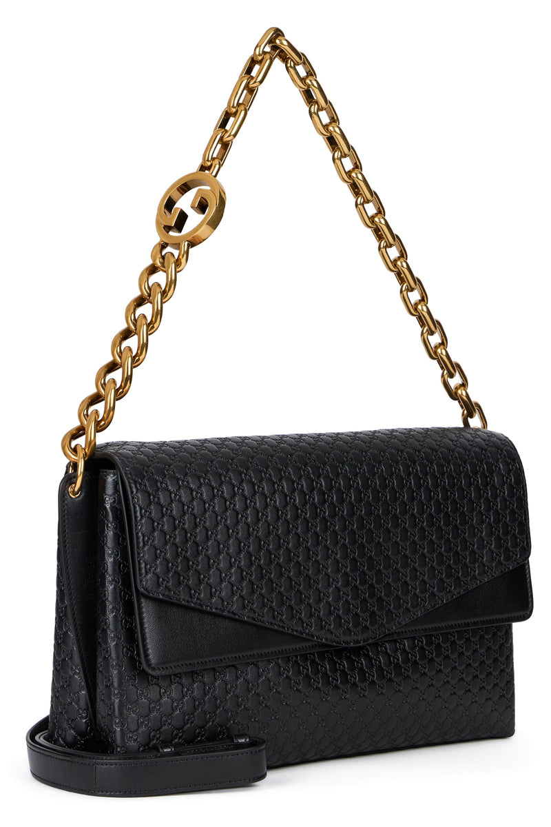 Gucci Gg Monogram Embossed Shoulder Bag — Black Calf Skin