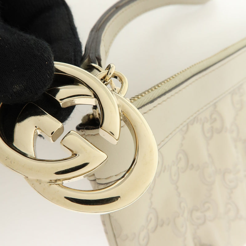 Gucci Heart Wristlet Guccissima Leather Beige Bag