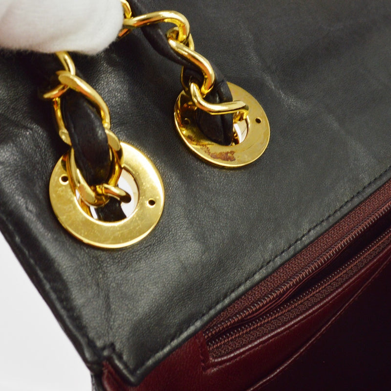 Chanel Classic Flap Vertical Quilted Lambskin Black Leather Bag