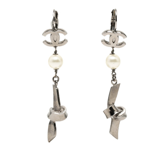 CC Brass Plated Faux Pearl Ribbon Knot Dangle Earrings - Image 1