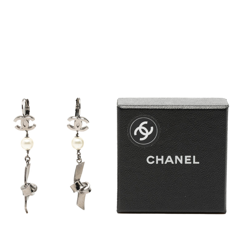 CC Brass Plated Faux Pearl Ribbon Knot Dangle Earrings - Image 4