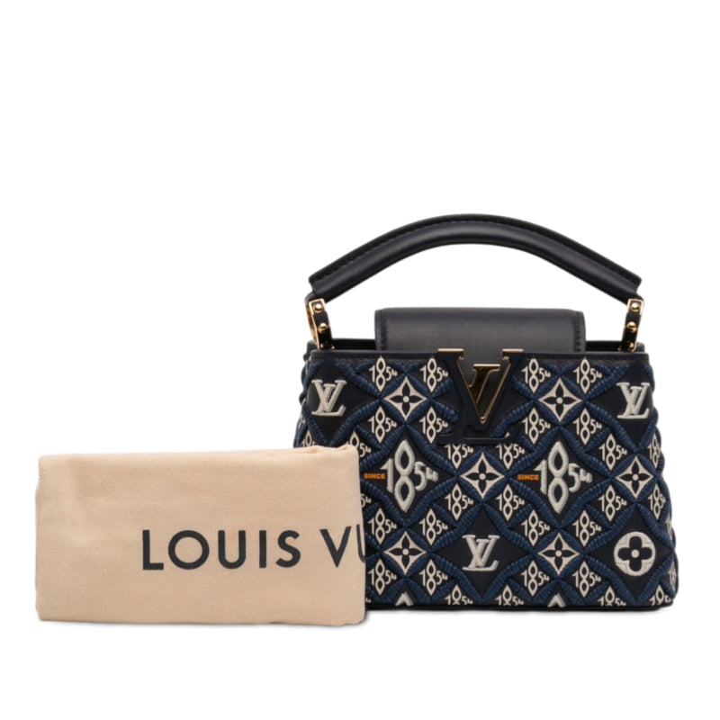 Monogram Since 1854 Capucines BB - Image 11