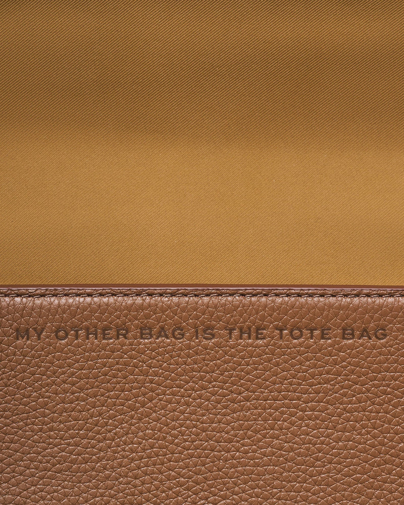 Marc Jacobs Embossed Logo Leather Mini Bag — Brown Cow