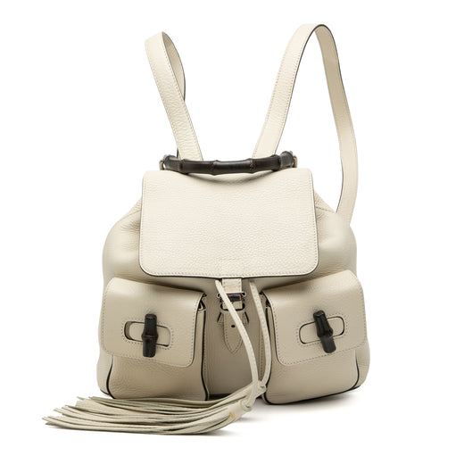 Grained Calfskin Bamboo Tassel Backpack - Image 1