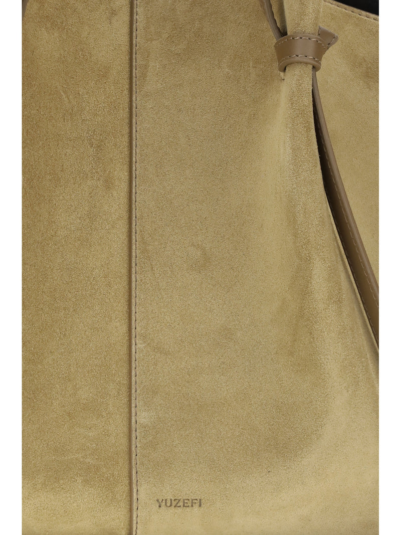Yuzefi Sculptural Suede Shoulder Bag — Beige Calf Leather
